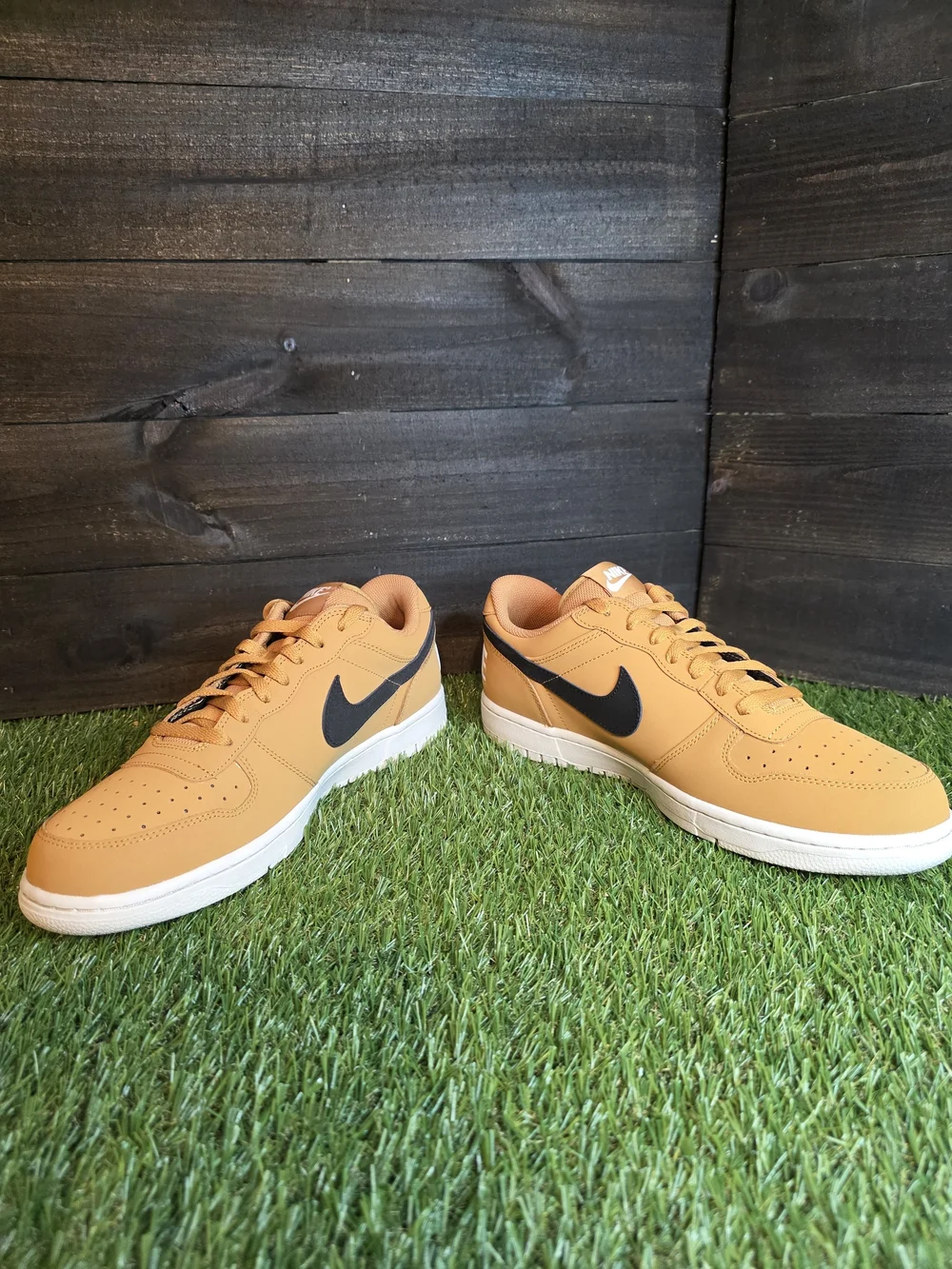 Nike Men's Low-Top Sneakers in Orange with Black Swoosh